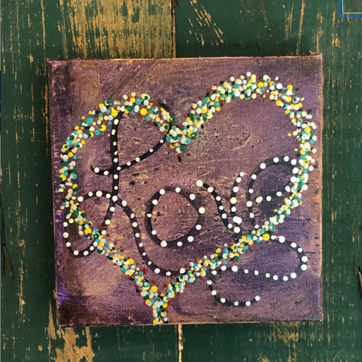 Love Makes the World Go 'Round... Multicolored heart with Love written in script.